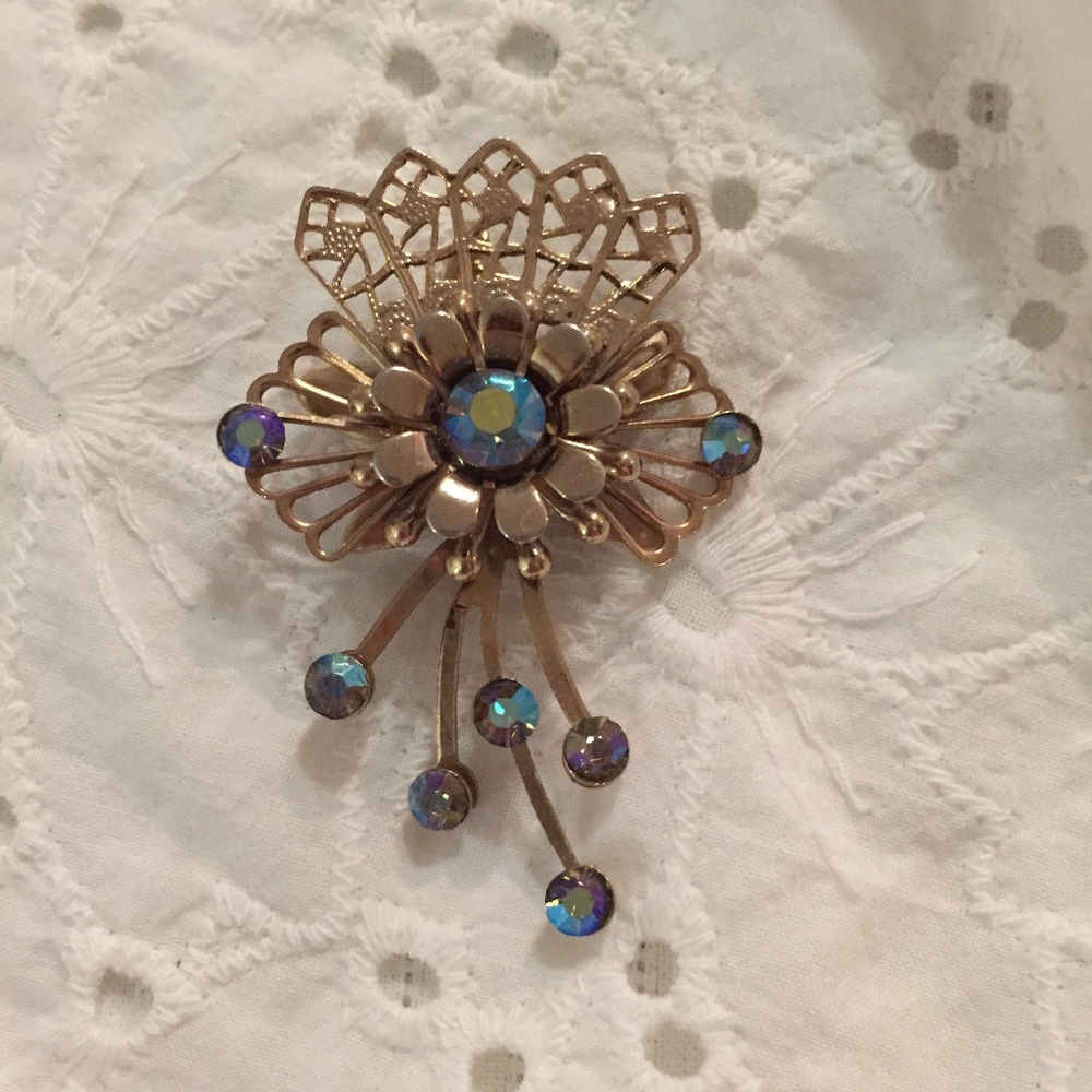 Vintage gold-tone pendant with blue stones